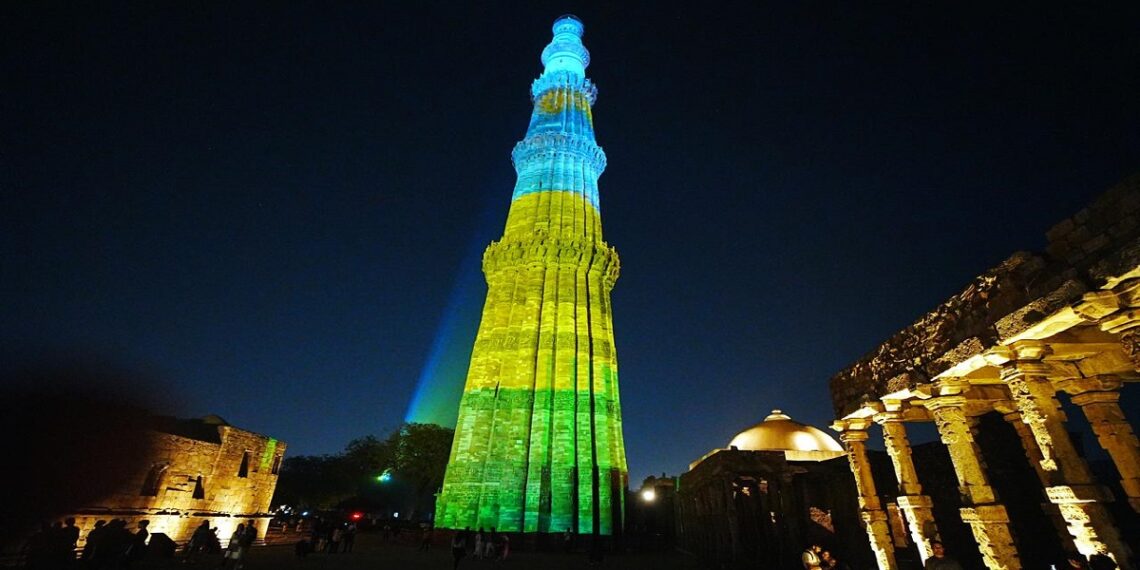 Qutub Minar in Rwandan flag colors