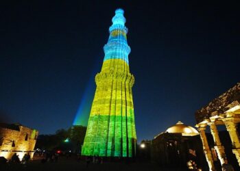 Qutub Minar in Rwandan flag colors