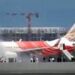 Breaking: Air India flight AI-315 caught fire during landing, causing panic