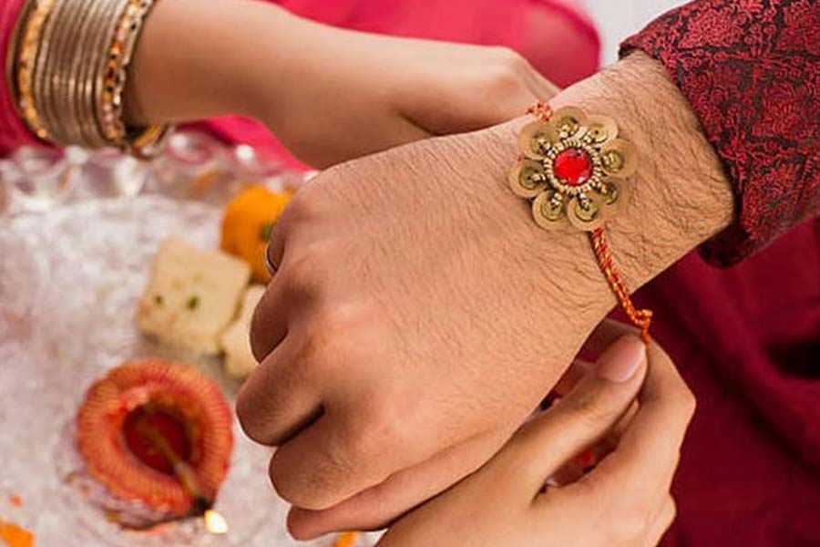 Why are three knots tied while tying a Rakhi? What is the belief